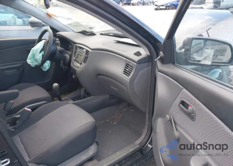 2009 Kia Rio Lx z USA, uszkodzony, nr VIN KNADE223X96573419